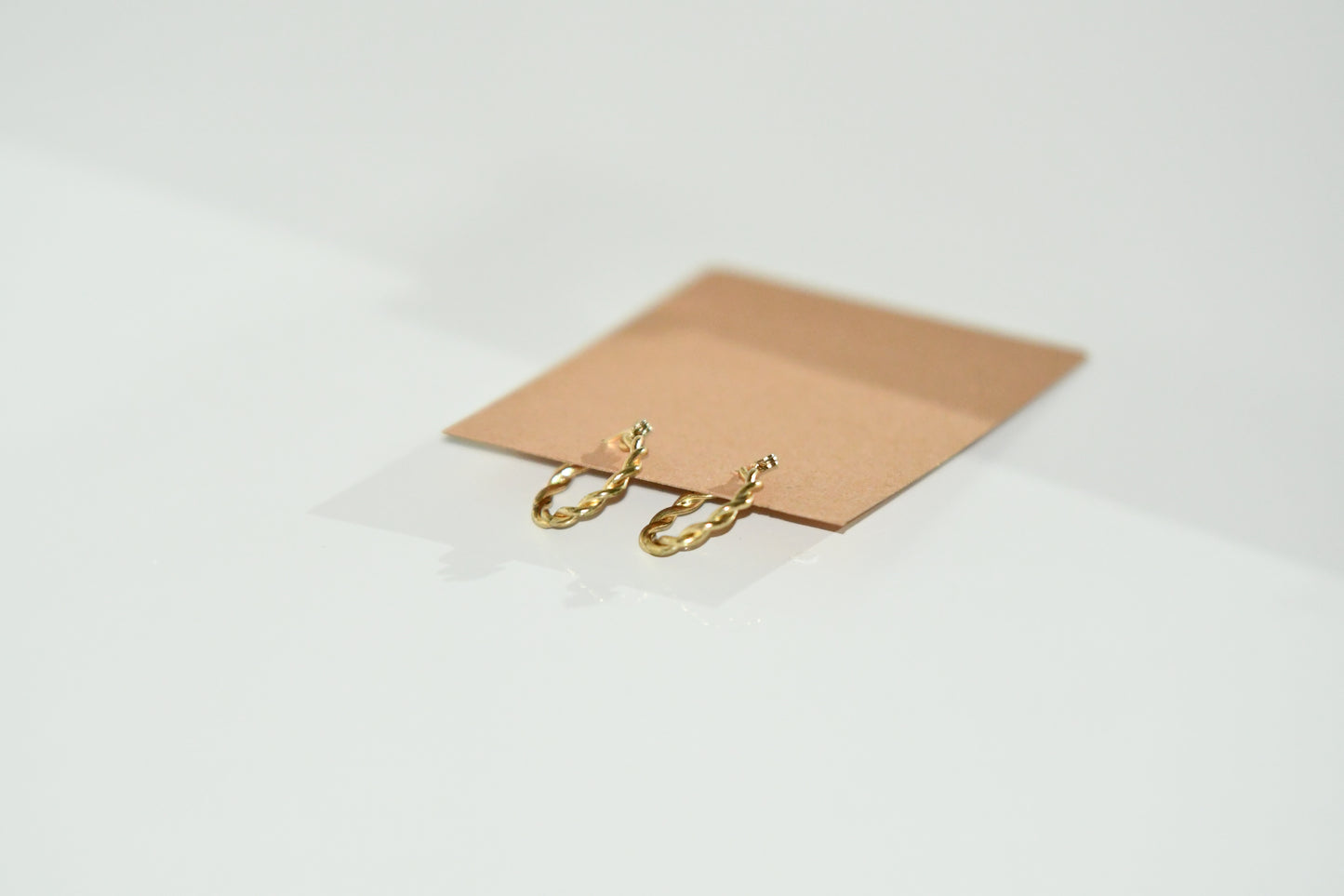 twisted gold loop earrings fair trade handmade jewelry